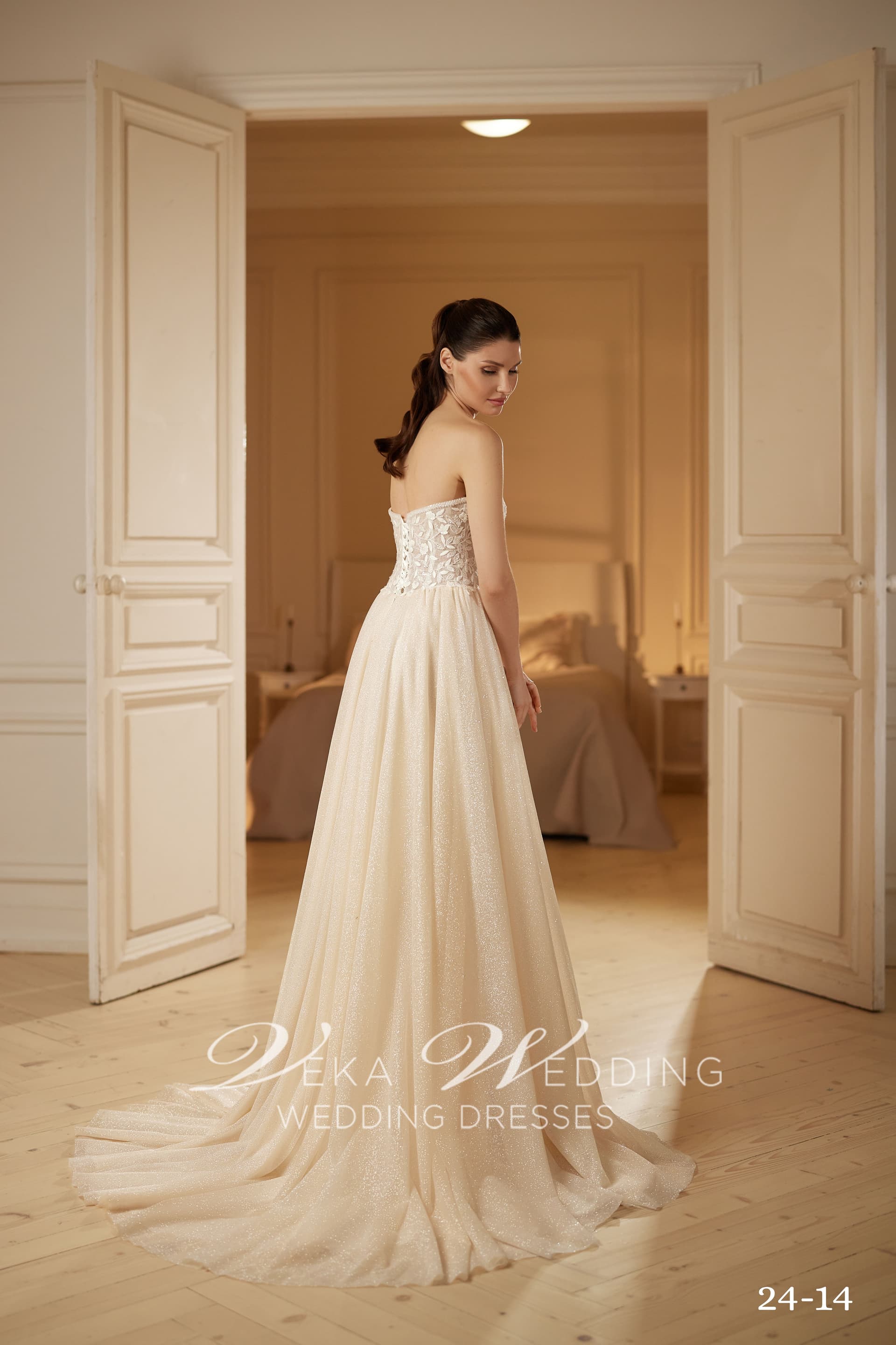 Adeline bridal gown — strapless lace-up corset back and glittering sweep train