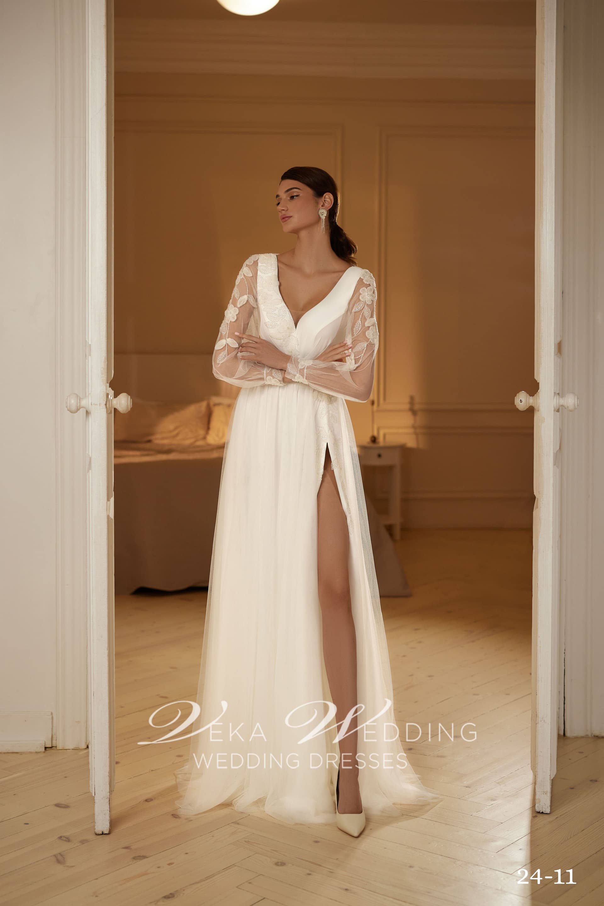 Isadora bridal gown — airy A-line silhouette with side slit and bishop sleeves