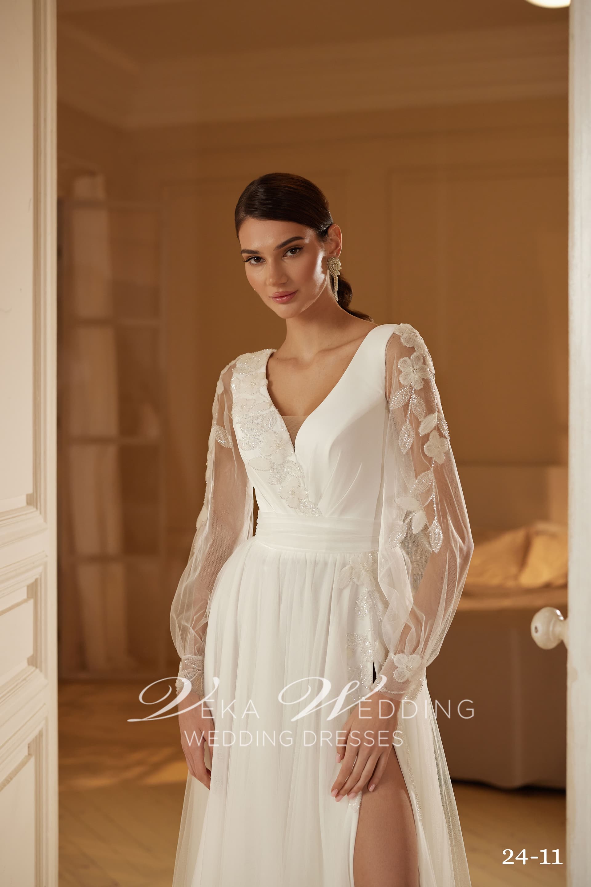 Isadora bridal gown — wrap V-neckline with delicate floral lace embroidery